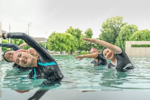 Preview: An engaging aquatic exercise class for seniors led by an instructor in a pool.