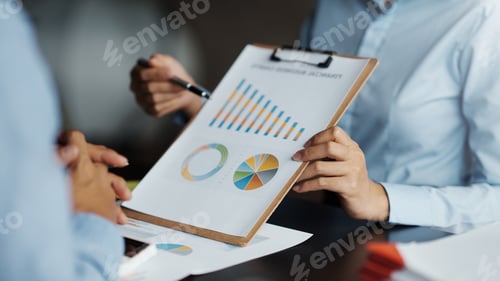 Preview: Business team jointly plan the investment at the meeting. Close-up of business people mentor pointin