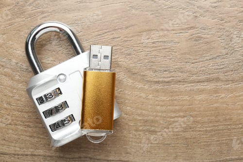 Preview: Flash drive and combination padlock on wooden background, top view. Space for text