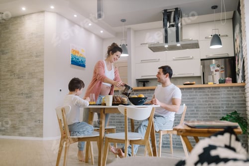 Preview: Family Breakfast in Modern Kitchen with Pregnant Woman