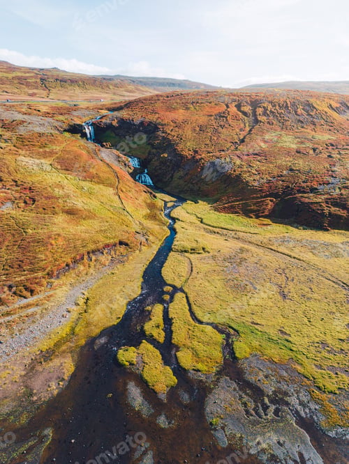 Preview: Looking down at mossy landscape around waterfalls in Iceland