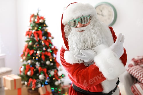 Preview: Authentic Santa Claus with funny glasses indoors