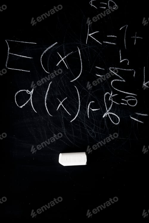 Preview: Part of maths formulas written by white chalk on the blackboard background.