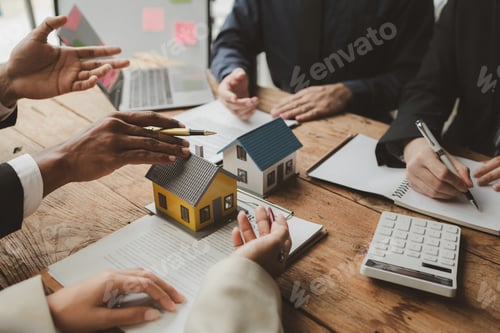 Preview: Business Meeting Discussing Home Ownership and Real Estate