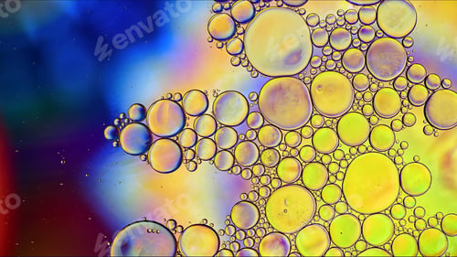 Preview: Abstract Colorful Food Oil Drops Bubbles and spheres Flowing on Water Surface