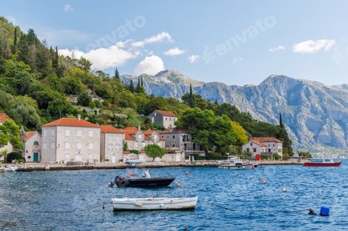 Preview: Cozy coastal town in Montenegro with traditional houses and sea view