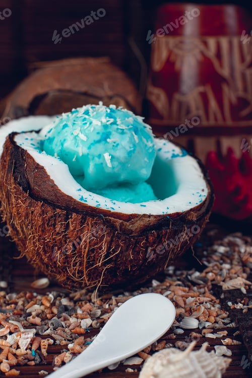 Preview: Blue ice cream in coconut bowl.
