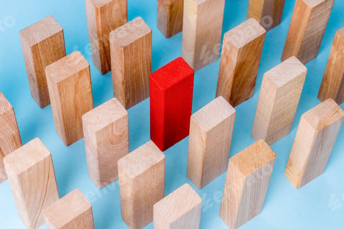 Preview: One Red Wooden Block Stands Out Among Many Natural Wood Blocks