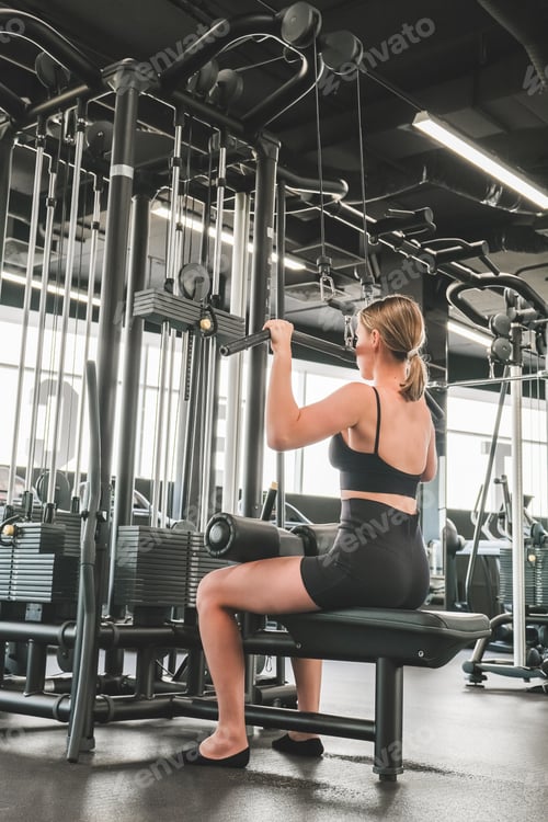 Preview: Workout. Gym,sport,Fitness,Fitness, motivation for working the gym, health improvement. Woman doing