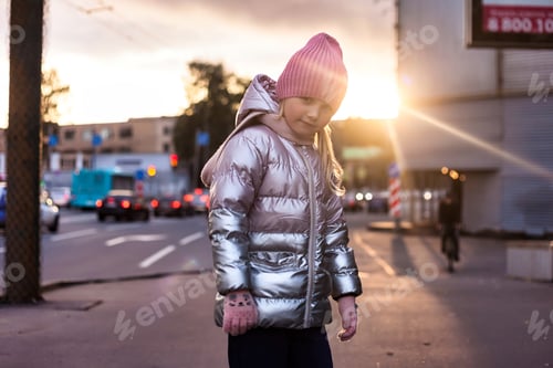 Preview: Seven Years Old, City Lights Catching Winter Sunlight on Her Jacket