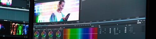 Preview: Back view of a young white man video editor