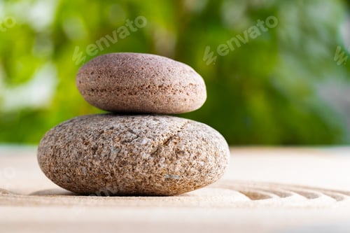 Preview: Japanese zen garden with stone in raked sand