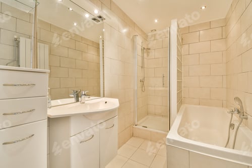 Preview: a white bathroom with a tub sink and shower