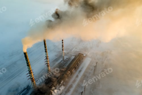 Preview: Aerial view of coal power plant high pipes with black smoke moving up polluting atmosphere at