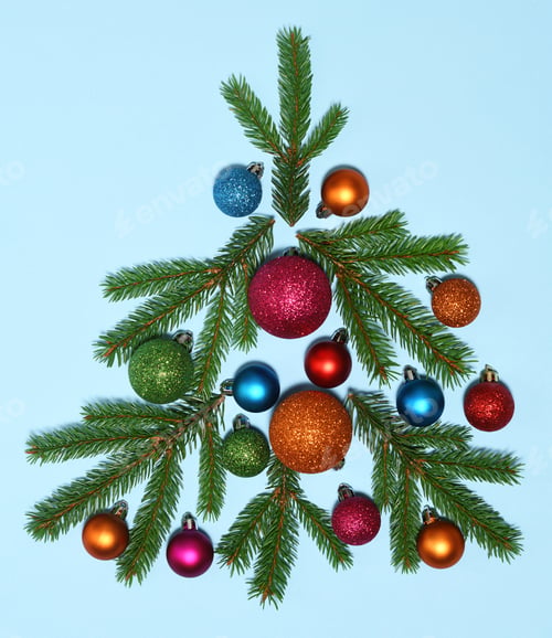 Preview: Christmas Tree Shape Ornament Arrangement on Blue Backdrop