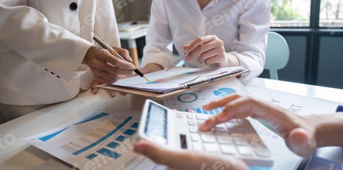 Preview: Business Team Collaboration on Financial Analysis and Strategy in Modern Office Setting