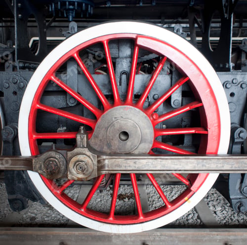 Preview: Close up of the rows of steel wheels of a locomotive steam train.