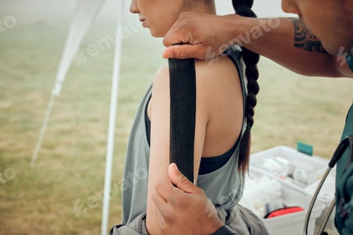 Preview: Cropped shot of an unrecognizable male physiotherapist working on a female patient outside