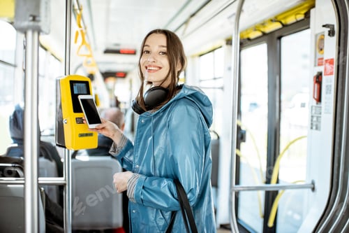 Preview: Woman paying with phone for the public tarnsport