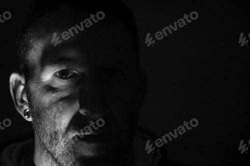 Preview: Man Half Lit Face in Black and White
