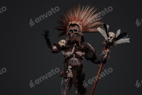 Preview: Antique aztec witch with ceremonial headwear and staff