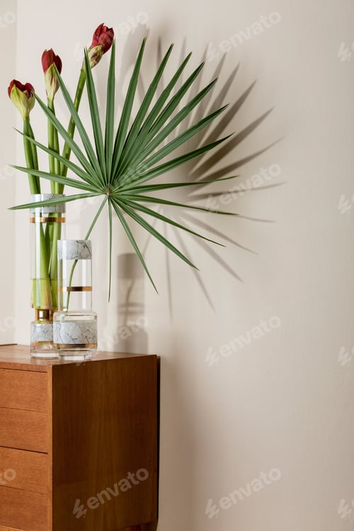 Preview: Stylish and floral composition of beautiful flowers in modern vases.