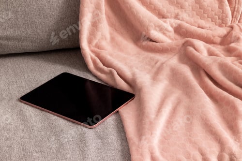 Preview: Tablet on textile sofa