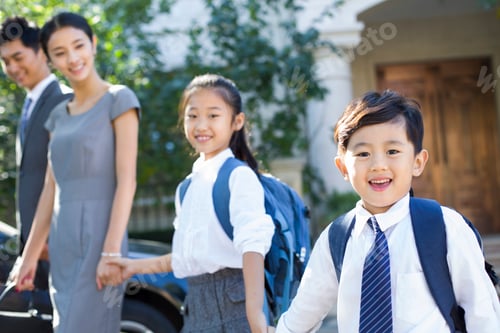 Preview: Young couple sending their children to school