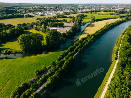 Preview: Summer aerial drone view landscape navigable river with bridges, agricultural fields