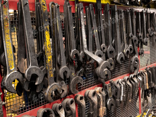 Preview: Array of tools visible on a wall display at a hardware store