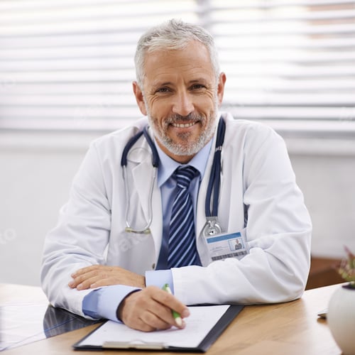 Preview: Healthcare you can trust. Portrait of a mature male doctor sitting at his desk.