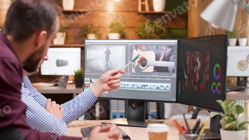 Preview: Videographer producer editing film production discussing movie graphic