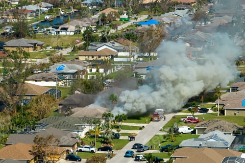 Preview: Burning residential house on fire with smoke and flames after short circuit spark