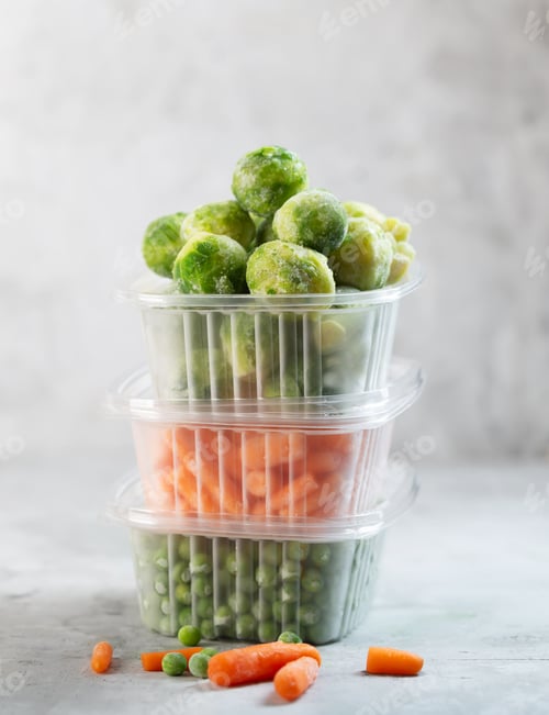Preview: Frozen vegetables such as green peas, brussels sprouts and baby carrot in the storage boxes