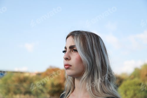 Preview: Woman with Long Hair Posing in Profile