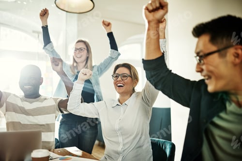 Preview: Diverse group of ecstatic colleagues cheering together in an office