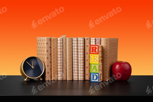 Preview: Stack of books on black wooden table