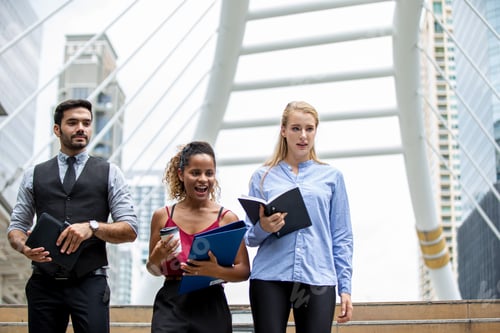 Preview: Group of successful colleagues and business people outdoor