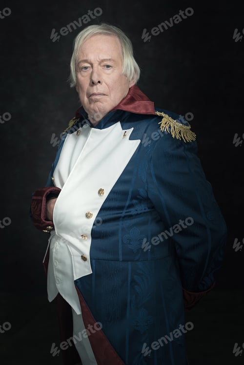 Preview: Official Portrait Of Senior Man Dressed In Historical Emperor Costume. Studio Shot Against Dark