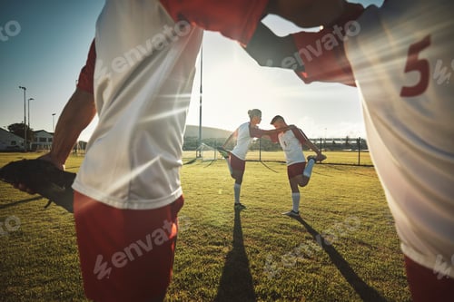 Preview: Sports, soccer and team of friends stretching before a game of football for health, fitness or spor