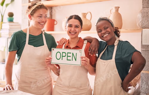 Preview: Small business, partnership and women with open sign for pottery startup, creative workshop and art
