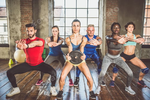 Preview: Mixed race group of athlete at the gym