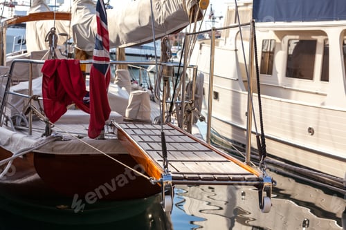 Preview: wooden ladder on marine yacht staying in port