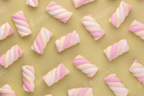 Preview: Colorful marshmallow laid out on pastel background. Creative textured pattern.