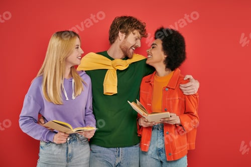 Preview: polygamy and love, interracial people holding books on coral background, cultural diversity,
