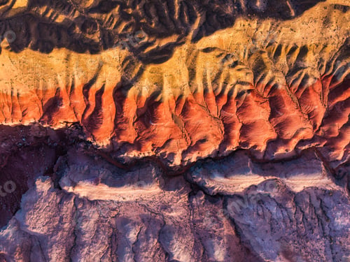 Preview: Colorful layered sedimentary mountain and sandstone texture pattern in Altyn Emel, Kazakhstan