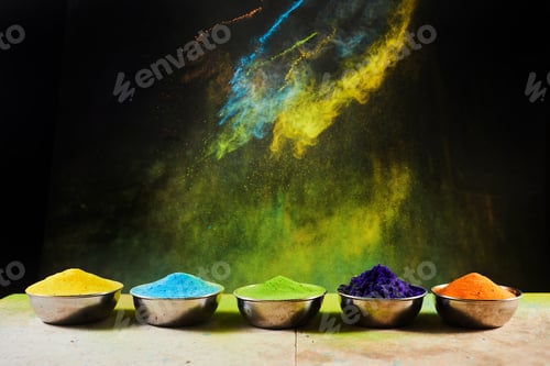 Preview: Colorful traditional Holi powder in bowls. Happy Holi. Concept Indian color festival.
