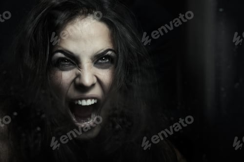 Preview: Screaming witch behind the wet glass