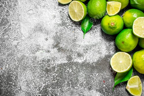 Preview: Ripe lime with green leaves.