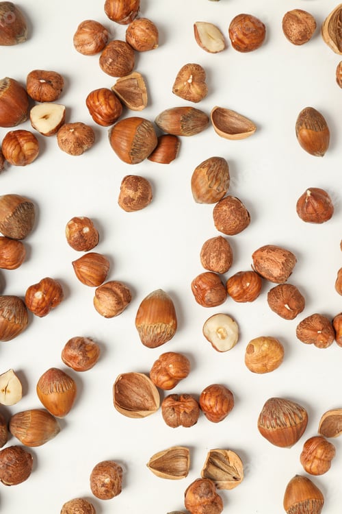 Preview: Healthy food and healthy nutrition concept, nuts - hazelnut
